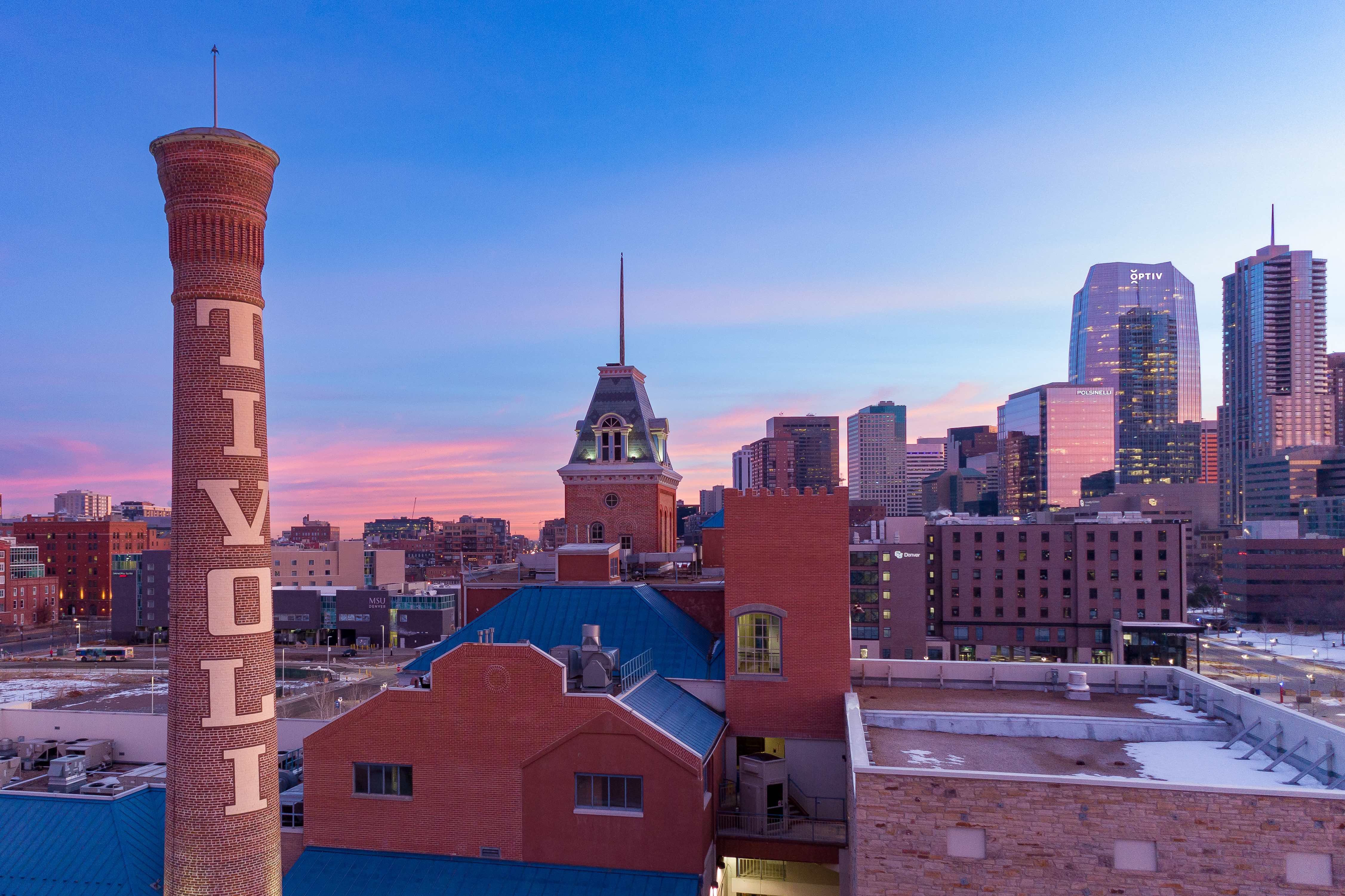 cu denver campus and skyline as dusk