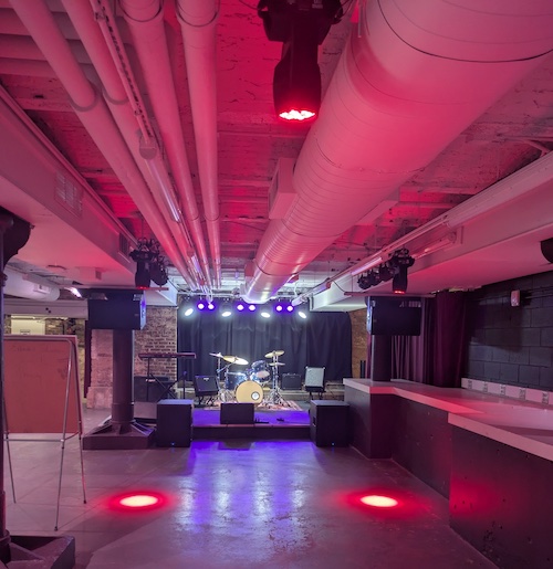 view of the stage in the Tivoli Underground with ambient lighting.